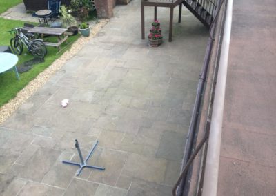 Indian Sandstone patio before cleaning
